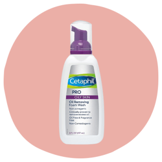 Cetaphil Pro Oil Removing Foam Wash in a white and purple pump bottle